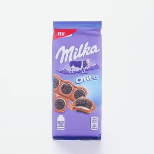 Шоколад молочный Milka в форме яйца с молочной начинкой и кусочками печенья Орео, 86 г